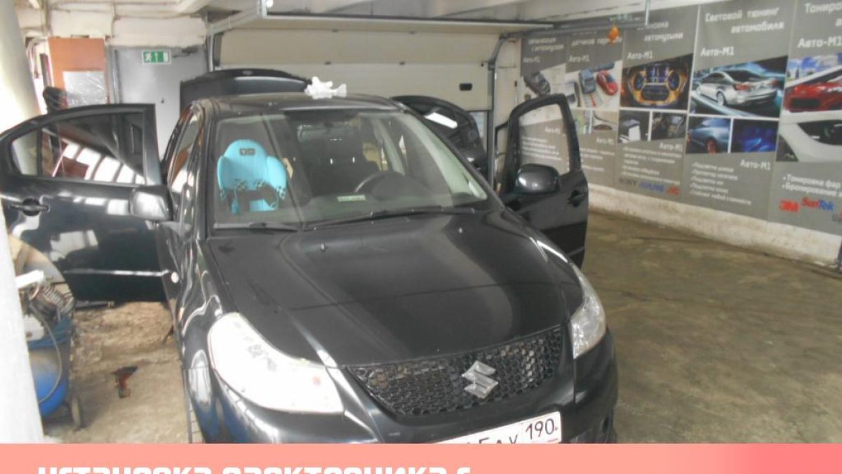 установка парктроника с камерой заднего вида на Suzuki SX4