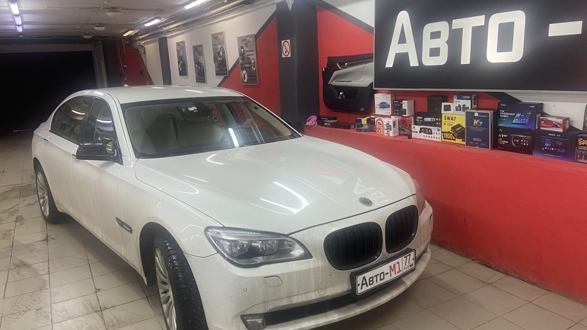 Установка омывателя камеры заднего вида на BMW 7 серии